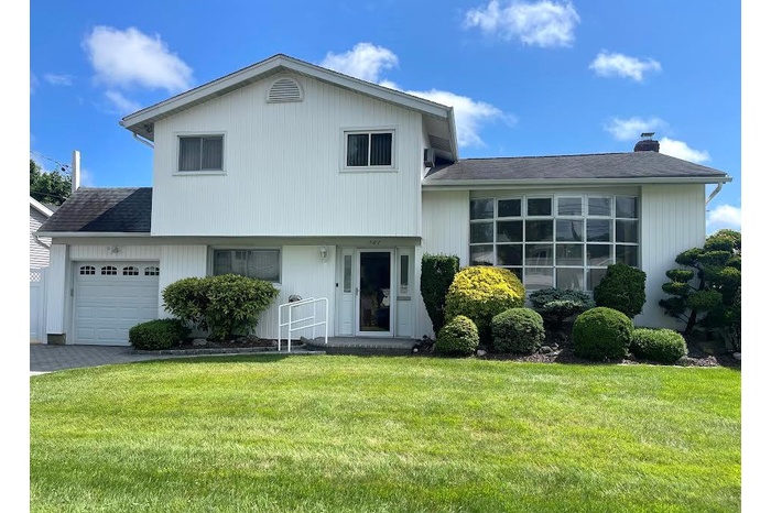 Split level home with fenced yard.