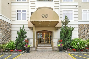 Fabulous Mint Condition Wellington Greene 2 BR 2 Bth, 3rd floor CORNER Unit with 9 ft ceilings and Treetop Views, Covered Terrace, Large Laundry Rm in Unit with full size ...