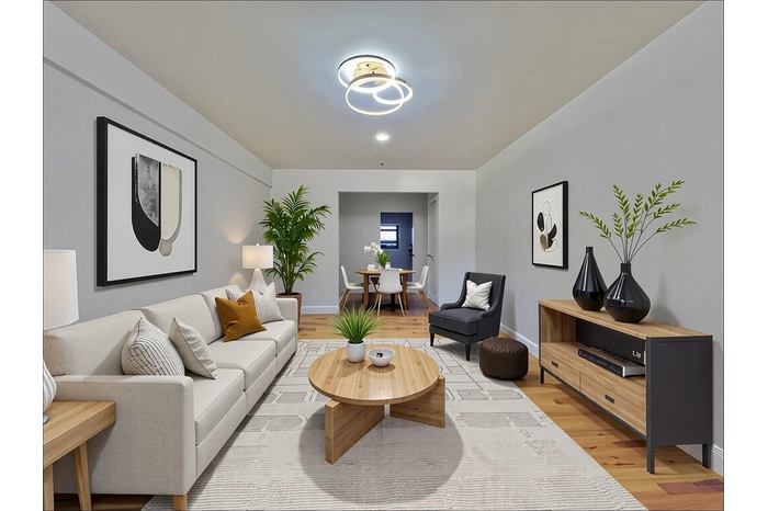 Living room featuring light wood-style flooring
