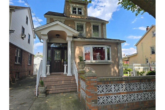 View of front of home with stucco siding