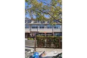 This income generated property is nestled within a secure gated community, boasting a spacious 2 bedroom, 1 bathroom unit on the first floor, complete with a living room and kitchen.