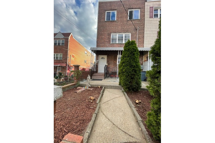 View of front of property with brick siding