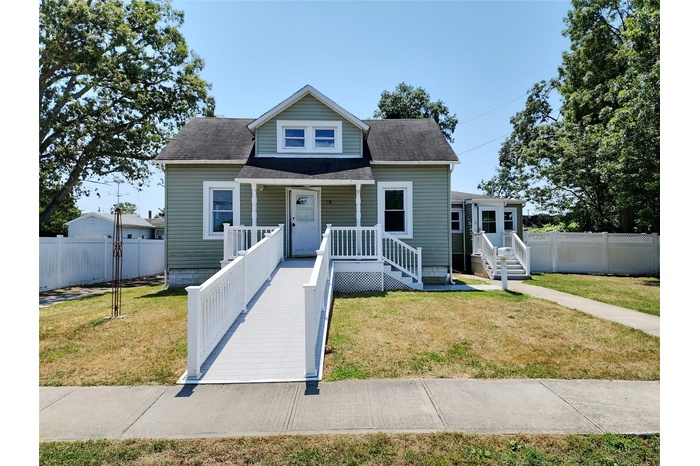 Bungalow-style house with a porch and a shingled roof