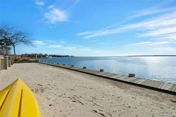 Water view with a boat dock
