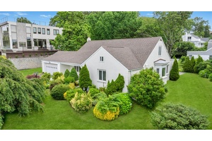 Welcome to this beautiful, five bedrooms, three bathrooms expanded ranch situated on a third of an acre lot in the prestigious village of Saddle Rock with winter water views.