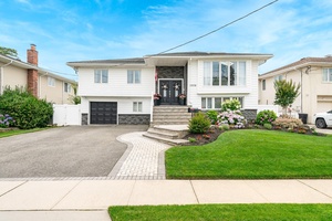 Beautiful and spacious 4 bedroom, 3 full bath raised ranch in desirable South Bellmore.