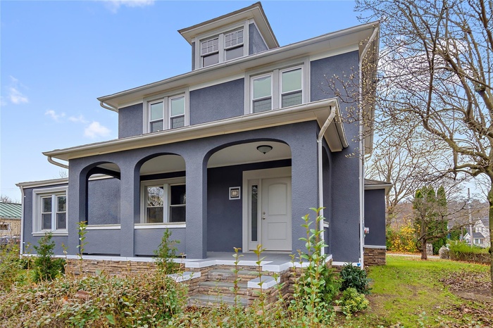 View of front of home with covered porch