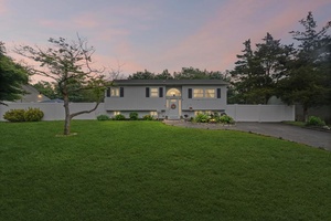 welcome to this 5 bedroom spacious Hi Ranch ideal for growing family or mother in law suite !