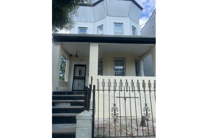 View of front of home featuring covered porch