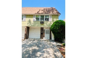 Welcome to this well maintained semi detached 2 family home located in the desirable neighborhood of Little Neck.