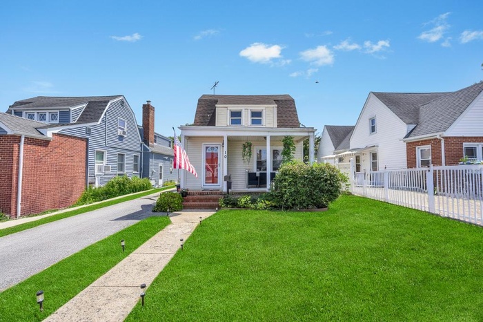 Colonial inspired home with a porch
