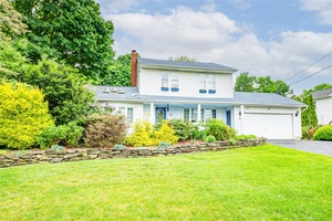 Entertainer's delight with multi tiered deck and fully private backyard.
