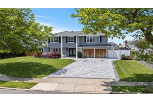 Waterfront Living in Captree Landings 22 Viking Dr, West Islip Tucked away on a quiet cul de sac in the coveted Captree Landings section of West Islip, this expansive 3, ...
