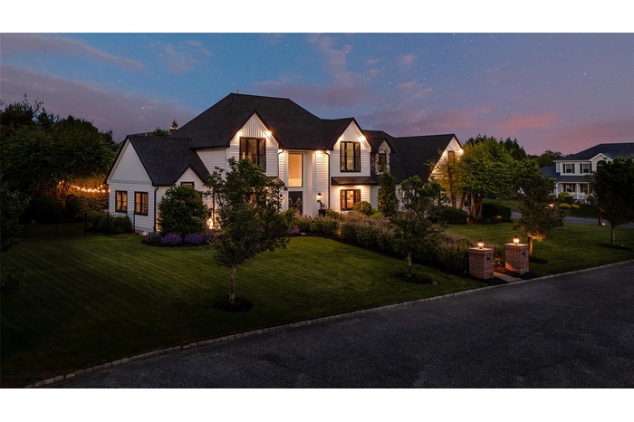 View of front of house with a lawn