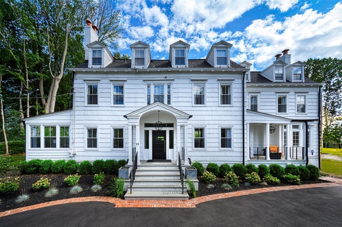 View of front of house with a chimney