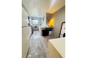 Located in a beautiful and well maintained co op building in the heart of North Flushing, this oversized corner unit 2 bedroom, 1.