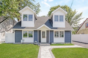 STUNNING 4 BEDROOM CUSTOM HOME IN THE HEART OF CEDARHURST LONG ISLAND.