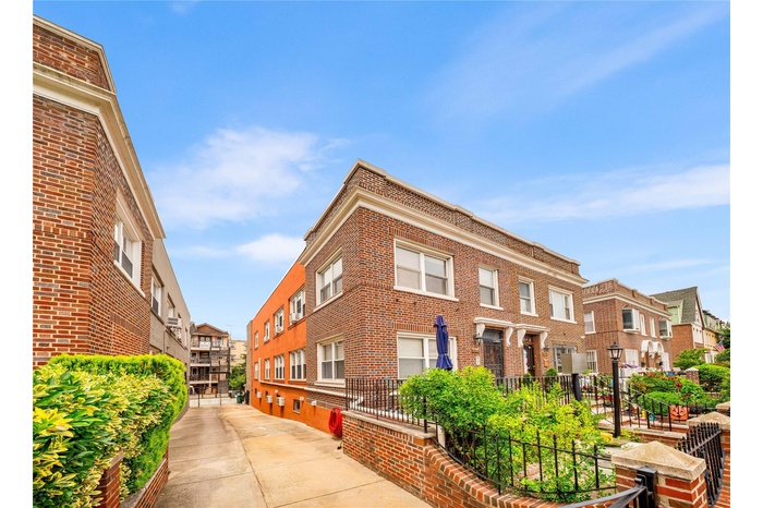 View of property with a residential view