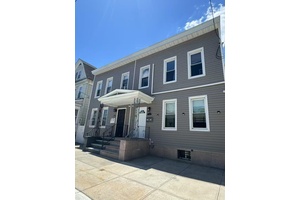 Rare 2 Family Semi Detached Home in the Heart of College Point.