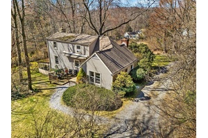 Endless Potential in the Heart of Bedford Village Tucked away on a quiet, tree lined country road just moments from the historic Bedford Village Green, this rare offering presents an ...