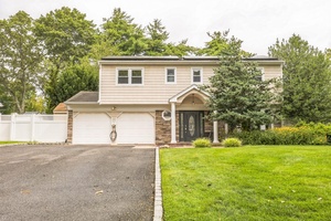 Beautifully Renovated 4 Bedroom Home in Commack LOCATION, LOCATION, LOCATION !