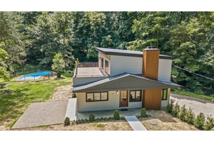 The only thing that stayed the same in this totally renovated Croton on Hudson home is the address.