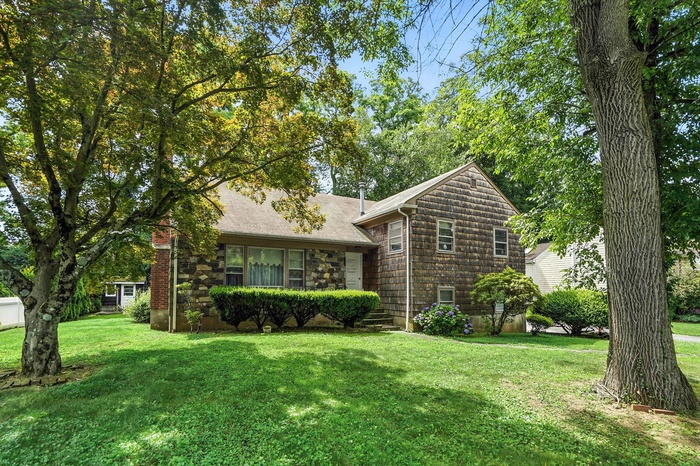 View of front of home with a front yard