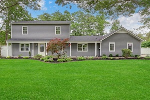 This beautifully renovated Colonial offers 4 spacious bedrooms and 2.