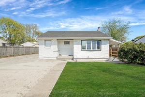 Beautifully renovated Ranch style home featuring 2 3 spacious bedrooms and stylishly updated full baths.