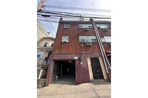 Elmhurst legal 2 family, with 3 family set up 663, 1st floor garage and 1br walk out.