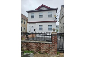Welcome to this lovingly maintained detached 2 family colonial residence, full of charm and potential !