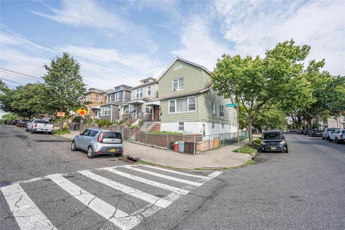 View of front of property with a residential view
