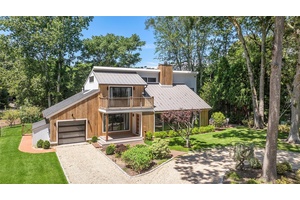 Welcome to this stunning, newly renovated contemporary home in the desirable Redwood section of Sag Harbor Village.