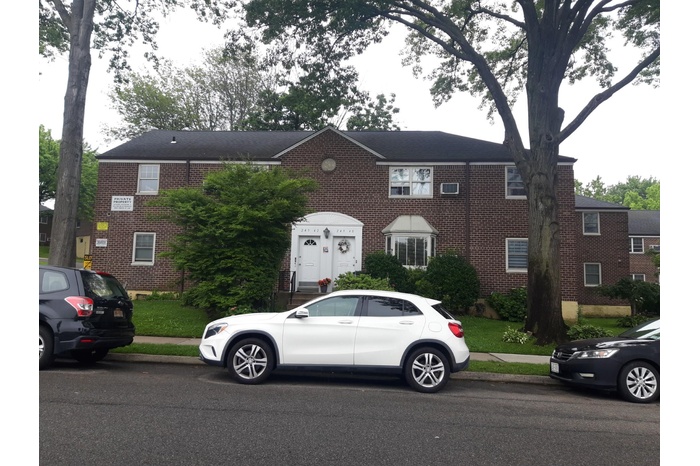 View of front of home with brick siding