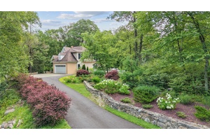 Discover the perfect blend of country charm and convenience in this custom built home, just 8 miles from Cold Spring trains to NYC.