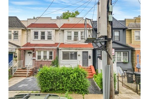 Welcome to 85 06 122nd Street, a well located two family home in the heart of Kew Gardens.