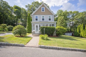 Welcome to this well maintained two family home with enclosed front porch.