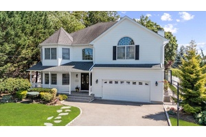 Welcome to this magnificent 4, 000 sq ft Colonial, built in 2005, nestled on an oversized 11, 800 sq ft lot in the heart of Bethpage.