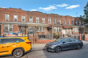 Excellent opportunity to own a Legal 2 family Brick Row house in the prime area of Woodside !