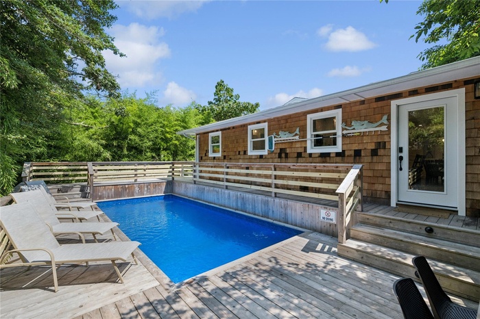 View of pool with a deck