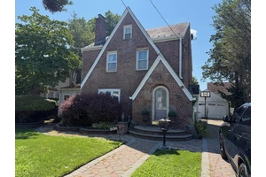 This home features 11 rooms Wood burning Fireplace in the sitting area, Hardwood floors updated Kitchen features a breakfast nook, wood cabinetry with Stainless Steel appliances with Gas Stove, Dining ...