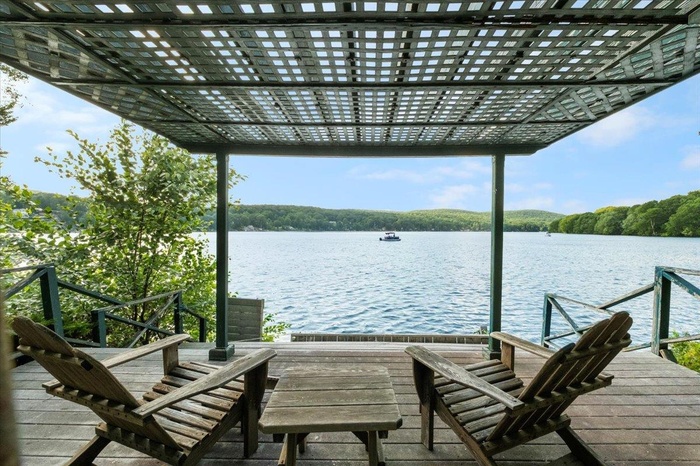 Enjoy a glass of wine in the evening overlooking Whaley Lake.