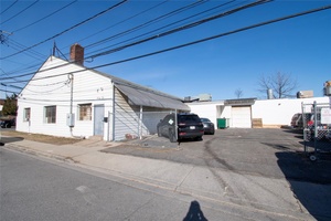 Warehouse manufacturing site For Sale on the corner of a unique street in the established neighborhood of Hempstead, Long Island.