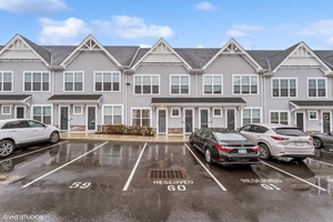 Luxurious 62 condominium with outstanding amenities in a prime location across from the Clubhouse and Pool.