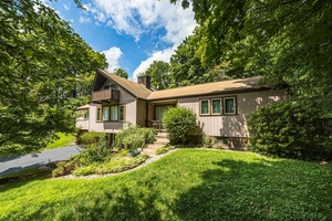 Nestled just minutes from the charming Village of Millbrook, this spacious 2, 436 sf ft home offers a perfect blend of privacy and proximity.