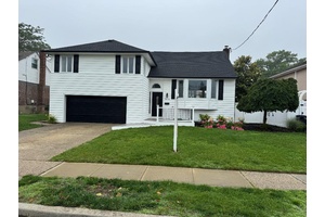 MOTIVATED SELLER ! Introducing this beautifully renovated Split Level home offering 4 spacious Bedrooms and 3.