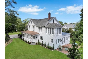 Nestled in the heart of the Historic District, this enchanting 1870 Victorian Farmhouse offers timeless elegance and a rich sense of history.