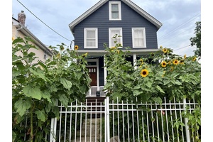 Sunny, historic Victorian detached home on a corner lot one block from Beacon s Main Street.