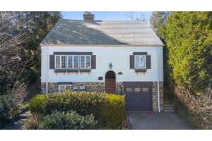 A delightful cottage style home with modern flair in a prime location.