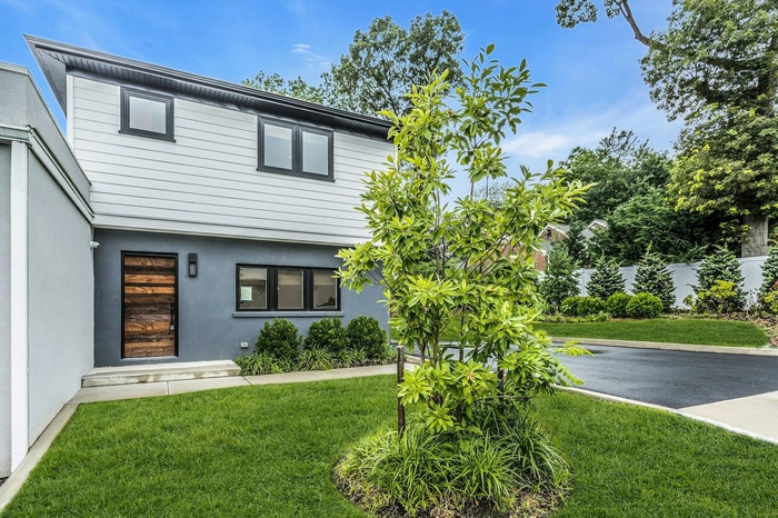 View of front of house with stucco siding